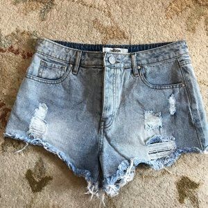 Never worn distressed cut off shorts